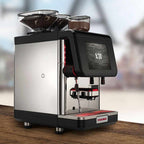 Modern coffee machine with digital display on a wooden surface
