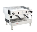 A commercial two-portafoglio espresso machine by La Marzocco, featuring a polished stainless steel body, black control knobs, a digital pressure gauge, and a built-in steam wand, shown on a solid white background.
